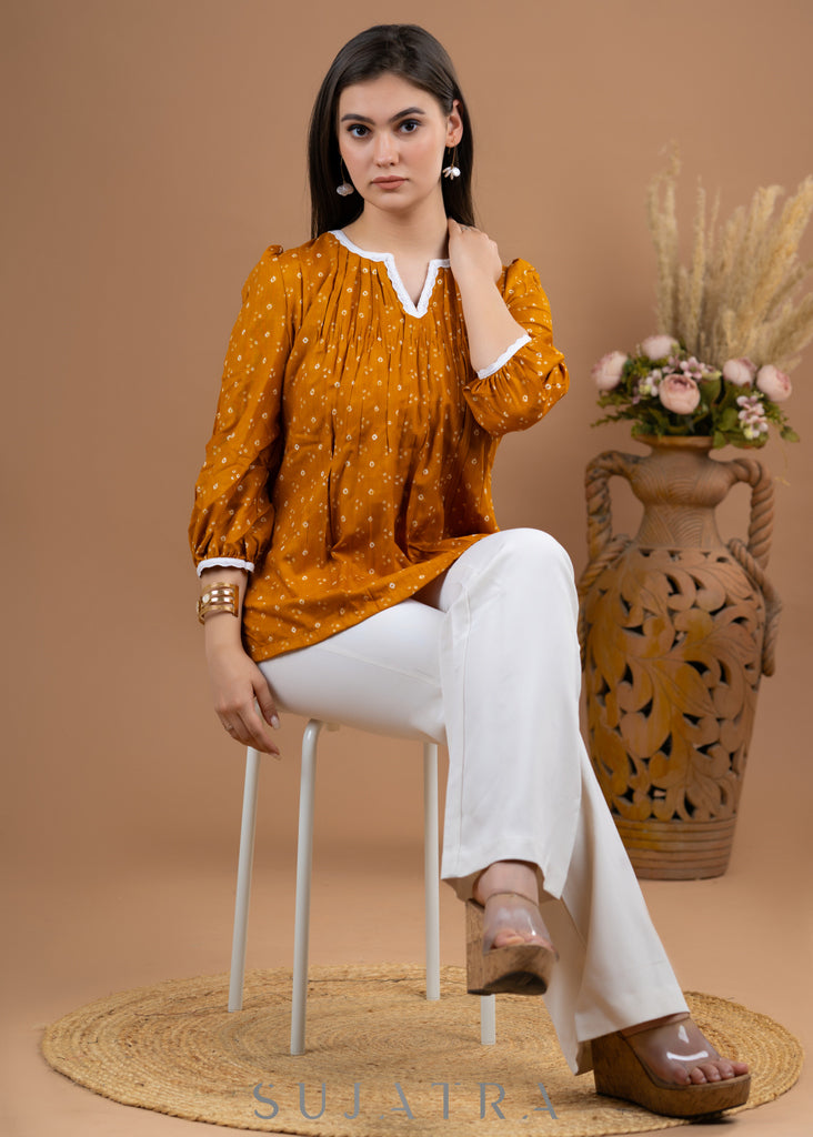 Stylish Mustard Rayon gathered top in bandhani print