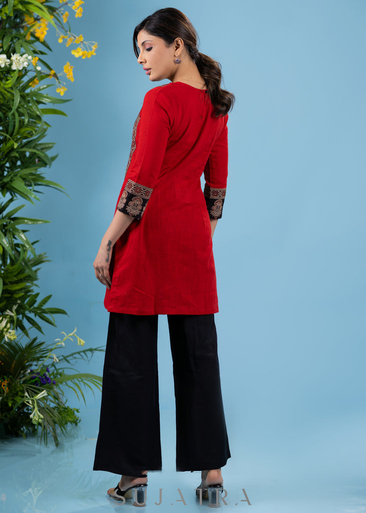 Classic red cotton tunic with ajrakh combination yoke highlighted with applique motif