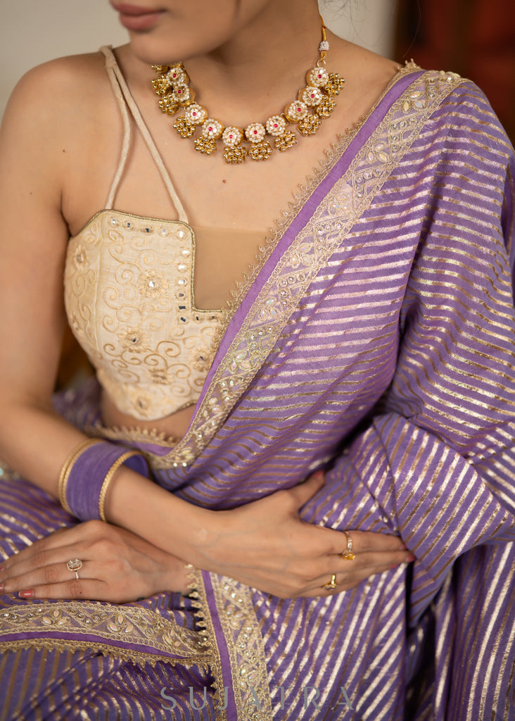 Gracious Lilac Striped Banarasi Saree Highlighted With Pearl Lace