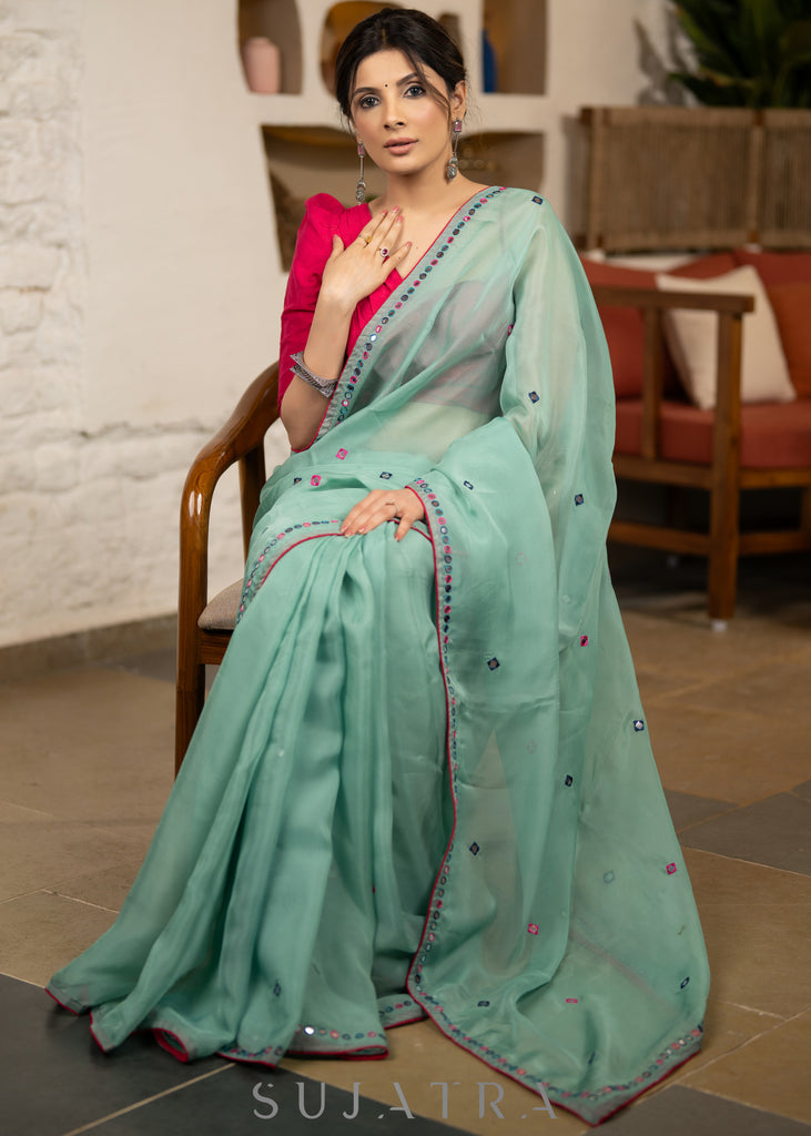 Designer Mint Green Organza Saree Highlighted With Overall Multicolour Mirror Embroidery