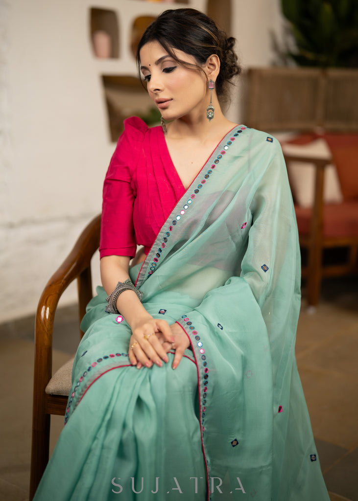 Designer Mint Green Organza Saree Highlighted With Overall Multicolour Mirror Embroidery