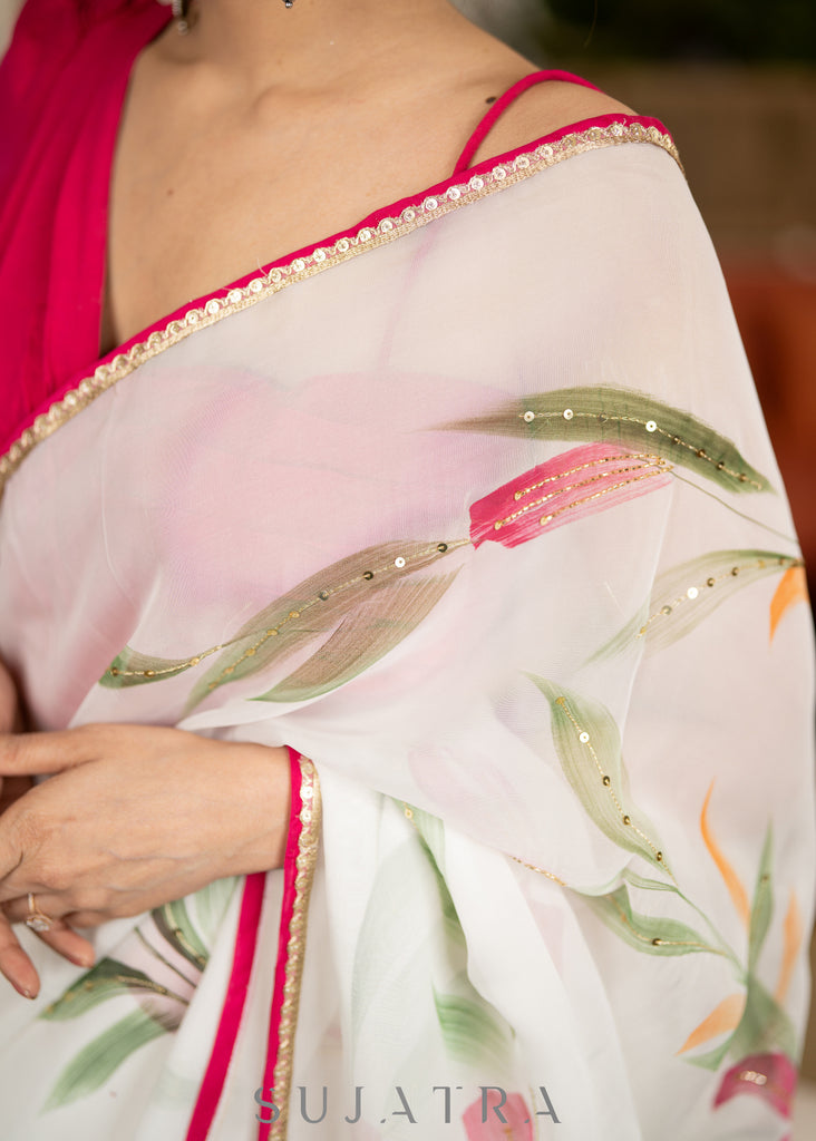 Trendy White Organza Saree With Overall floral Brush Painting Highlighted With Minimal Hand Embroidery