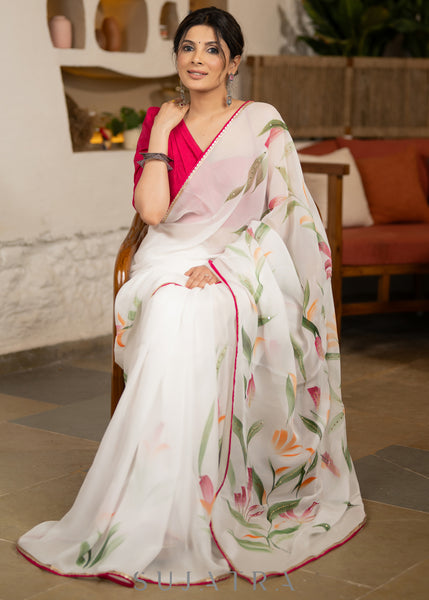 Trendy White Organza Saree With Overall floral Brush Painting Highlighted With Minimal Hand Embroidery