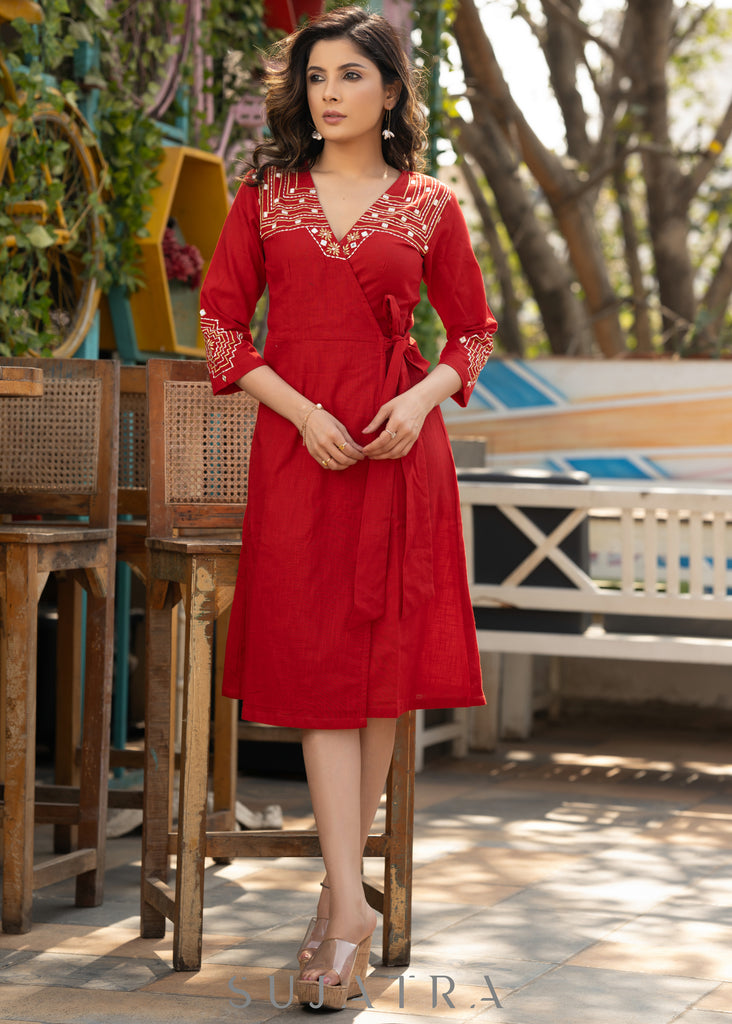 Beautiful red cotton overlap dress highlighted with intricate embroidery
