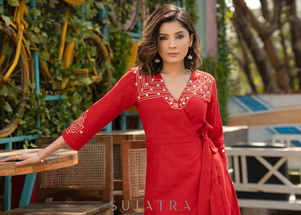 Beautiful red cotton overlap dress highlighted with intricate embroidery