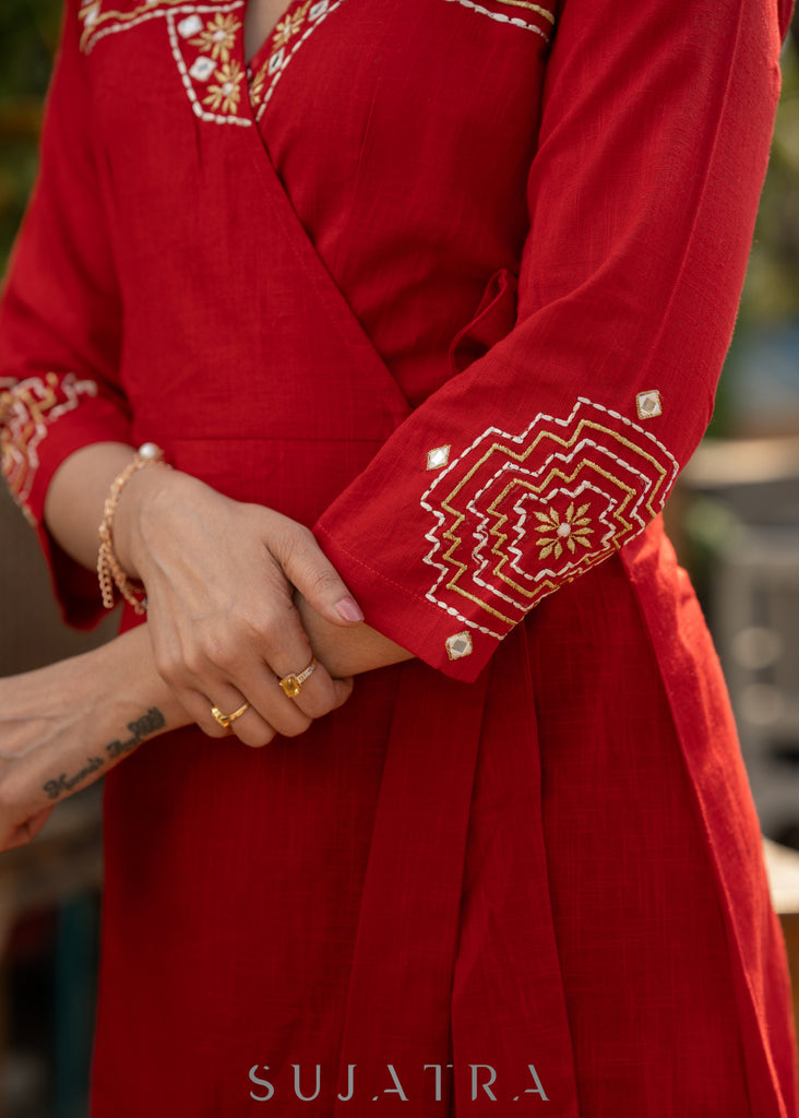 Beautiful red cotton overlap dress highlighted with intricate embroidery
