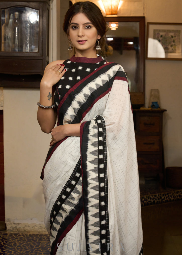 Stylish white cotton saree with ikat combination