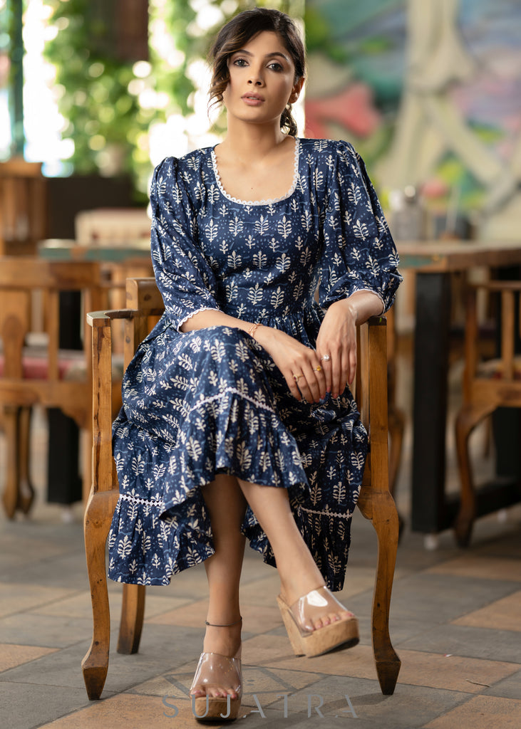 Trendy navy blue floral printed rayon gathered dress highlighted with beautiful lace