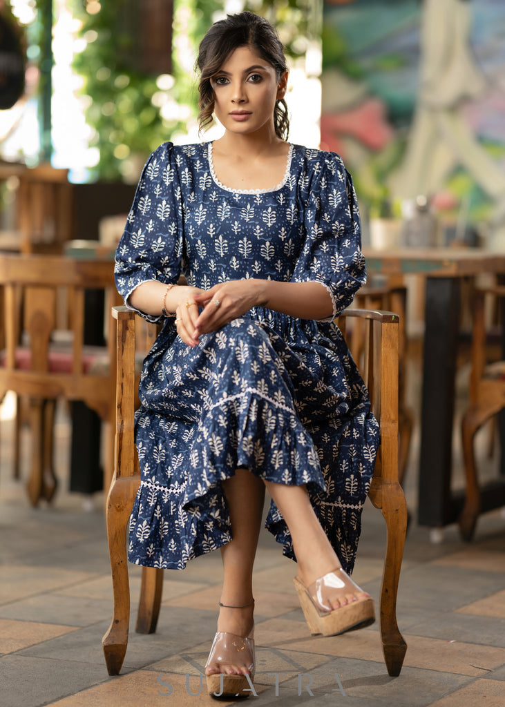 Trendy navy blue floral printed rayon gathered dress highlighted with beautiful lace