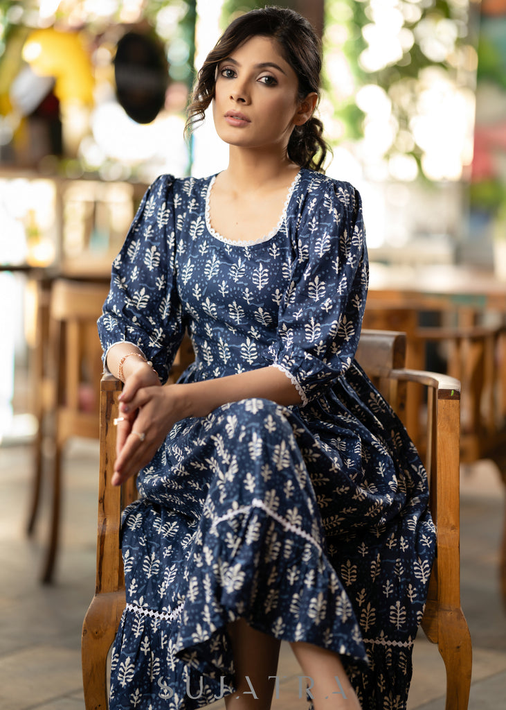 Trendy navy blue floral printed rayon gathered dress highlighted with beautiful lace