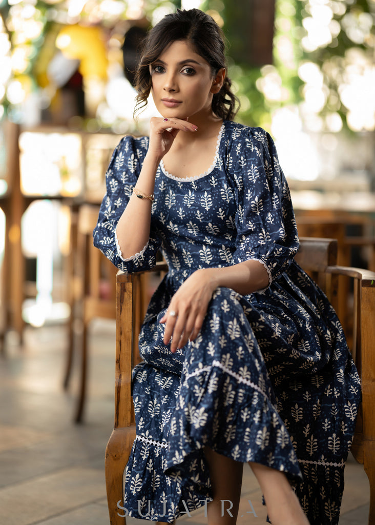 Trendy navy blue floral printed rayon gathered dress highlighted with beautiful lace