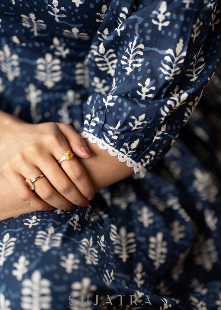 Trendy navy blue floral printed rayon gathered dress highlighted with beautiful lace