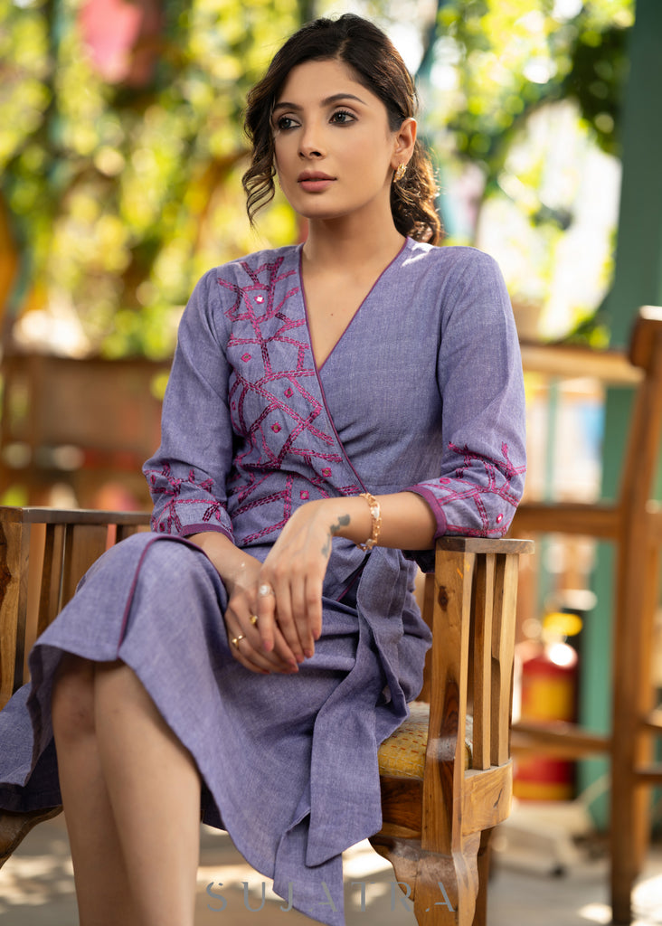 Elegant lilac cotton overlap dress highlighted with contrast embroidery