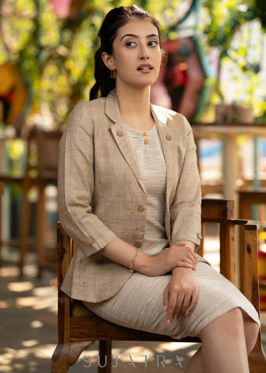 Beige blazer with striped dress