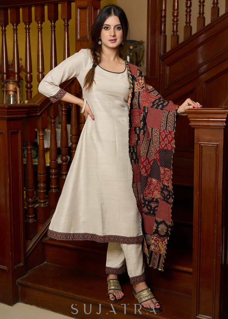Off-white handloom kurta with contrast ajrakh highlights, paired with complementing pants - Patch work stole Optional