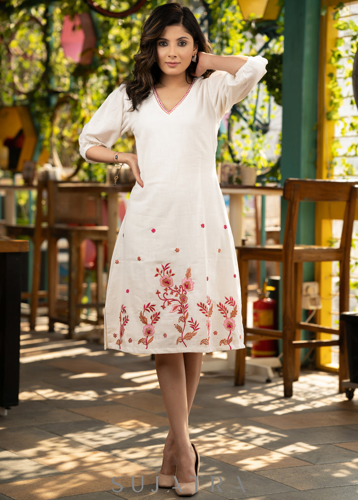 Beautiful ivory cotton dress with floral embroidery paired with matching shibori stole