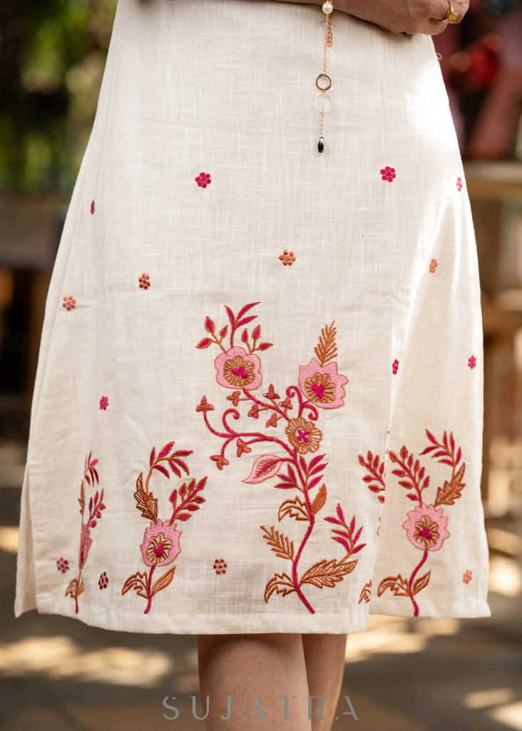 Beautiful ivory cotton dress with floral embroidery paired with matching shibori stole