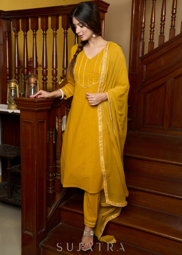 Graceful delicate mustard cotton kurta with a lace yoke and matching pants - Dupatta Optional