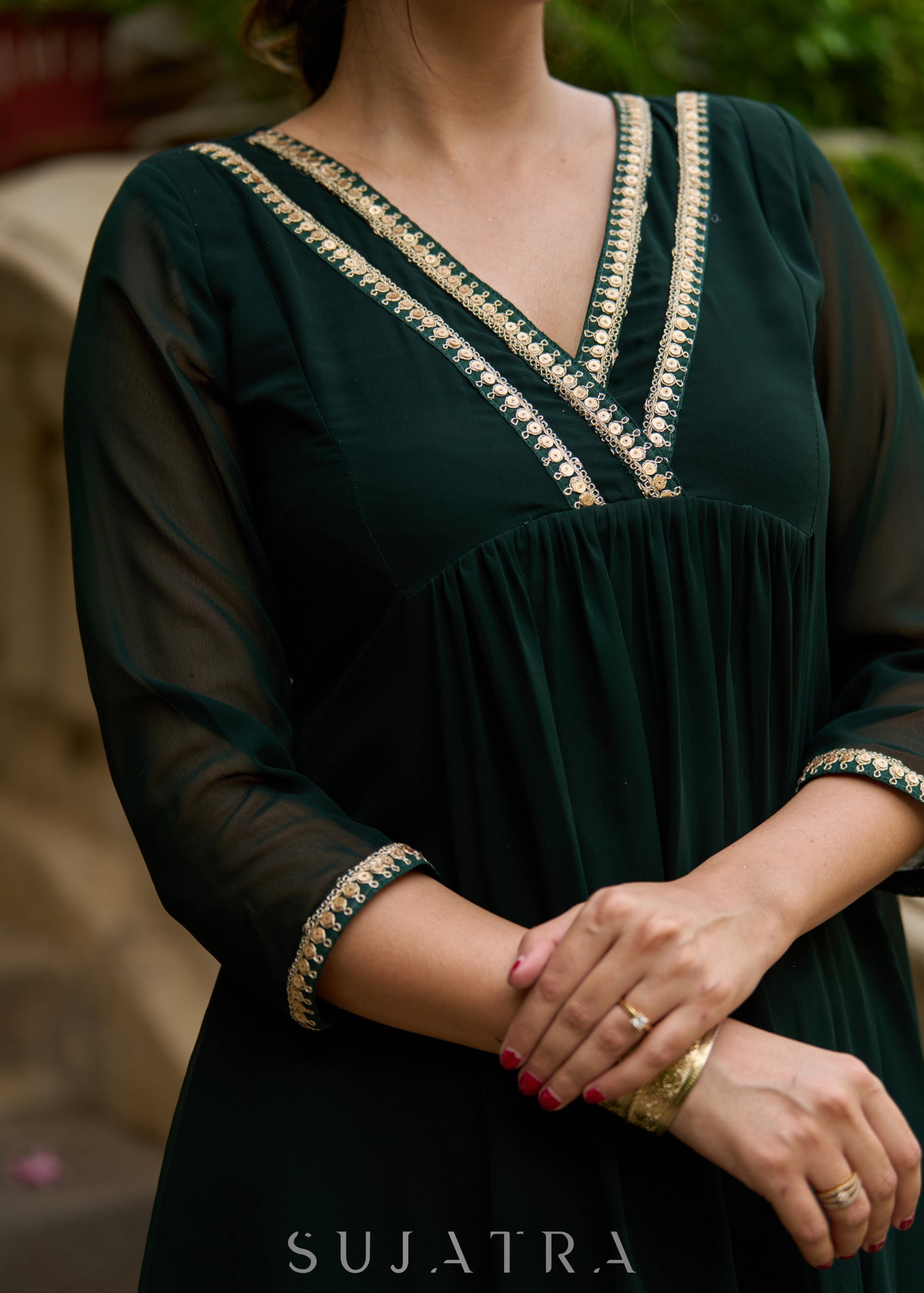 Elegance redefined in this captivating green georgette lace kurta - Pant additional