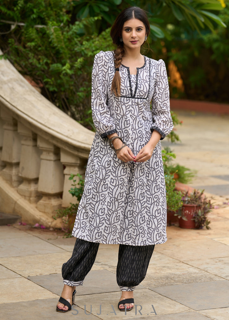 Versatile & stylish white hakoba bandhani printed kurta with Ikat Afghani pants -Dupatta Optional