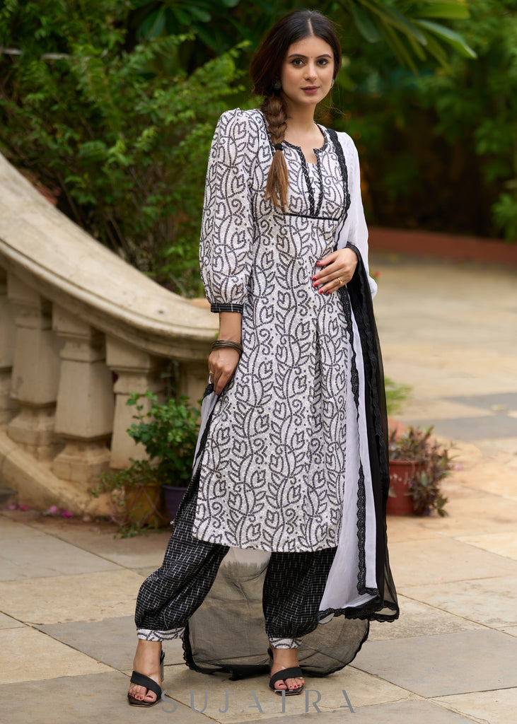Versatile & stylish white hakoba bandhani printed kurta with Ikat Afghani pants -Dupatta Optional
