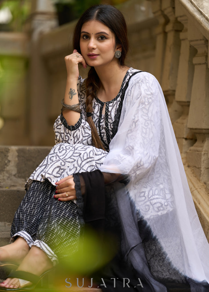 Versatile & stylish white hakoba bandhani printed kurta with Ikat Afghani pants -Dupatta Optional