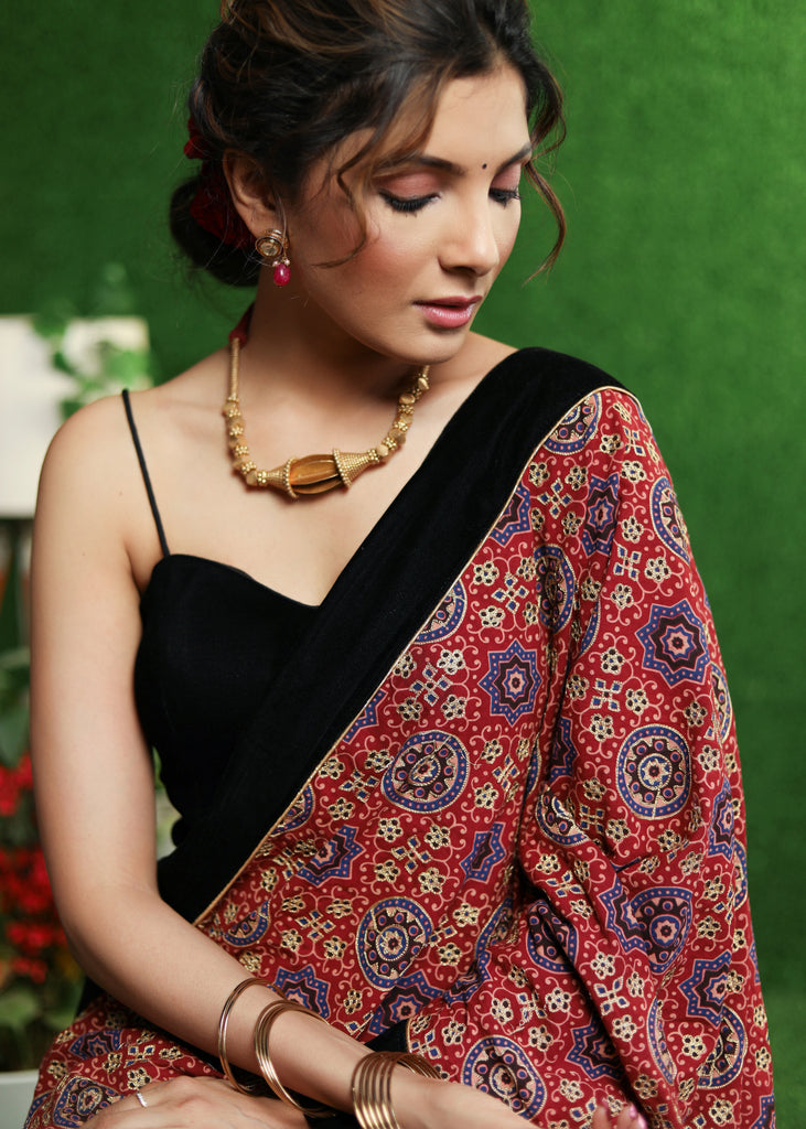 Stylish red Ajrakh & lavender Khun saree with Zari work on Pallu