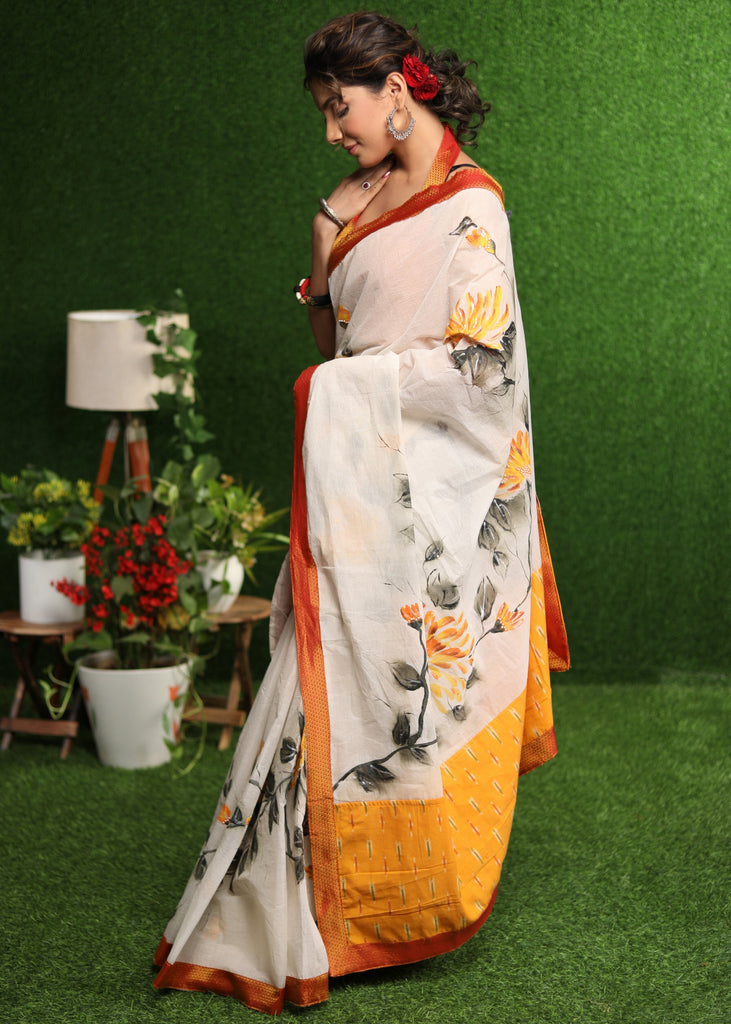 Elegant white saree with classy floral hand painting with Khun border