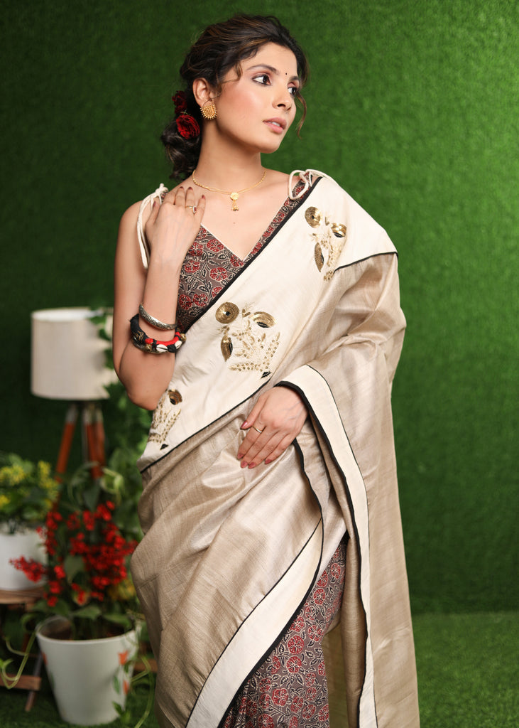 Graceful Tusser silk & Ajrakh combination saree with delicate beige silk sequence embroidery