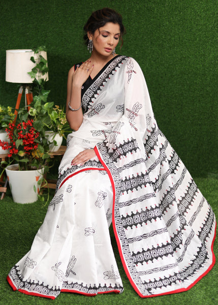 Classy white Chanderi block print saree with delicate hand embroidery