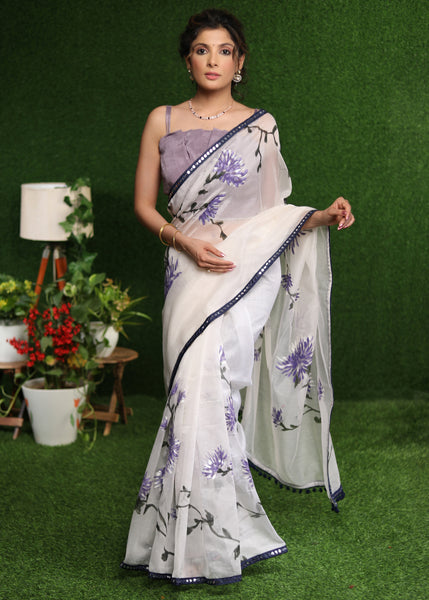 Designer white saree with lavender hand painting and Mirror work border