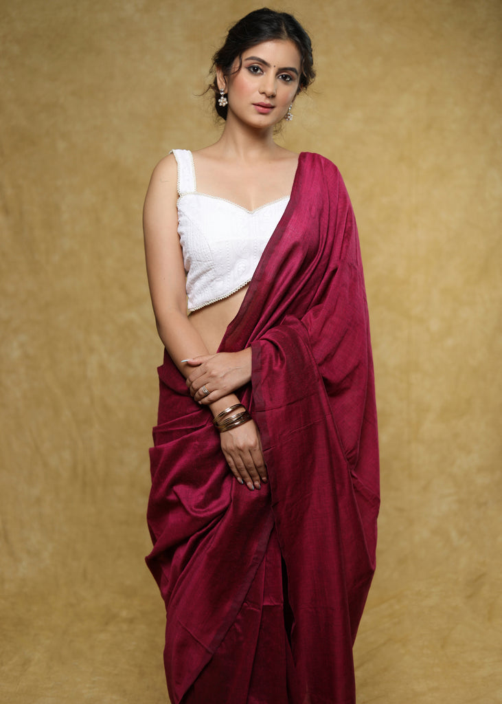 Elegant white Chikankari strappy blouse with Moti detailing.