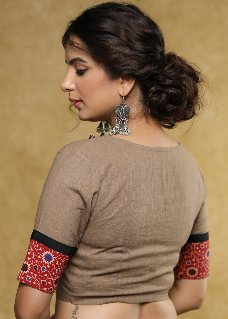 Smart light brown Cotton blouse with red printed detailing on the sleeves