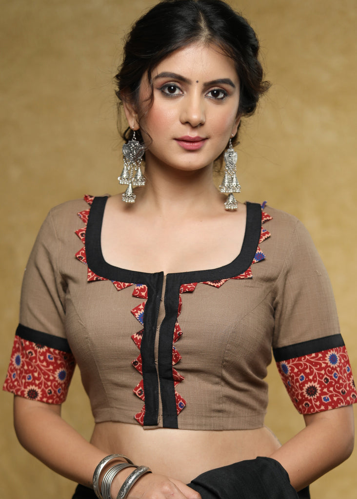 Smart light brown Cotton blouse with red printed detailing on the sleeves