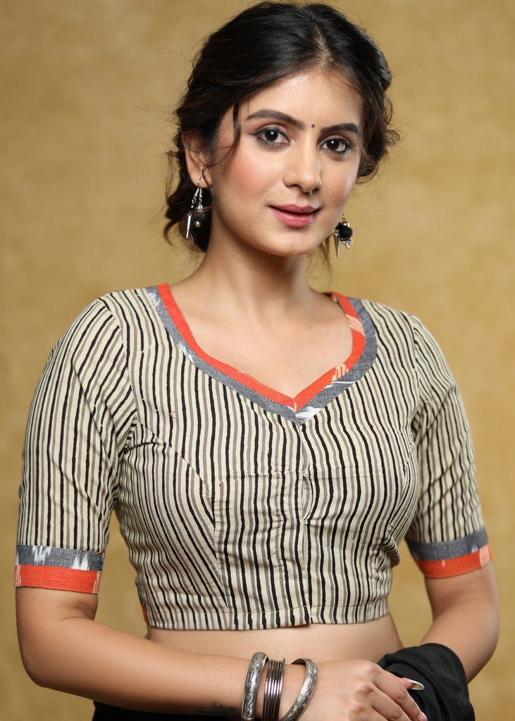 Classy grey stripped blouse with orange & grey Ikat detailing at the back