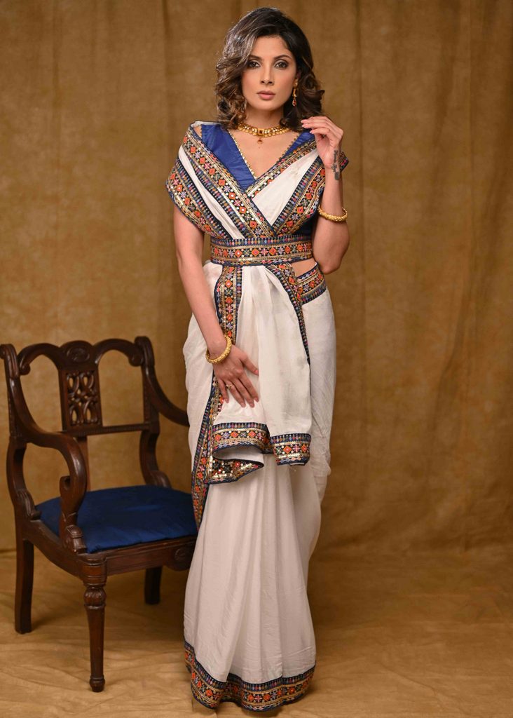 Beautiful White Chinnon Saree with Blue Delicate Border