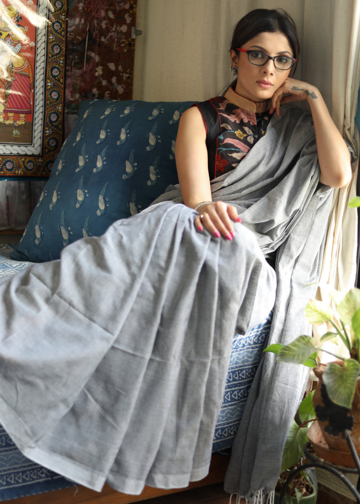 Breezy slate grey Cotton saree with white tassel and Kalamkari blouse piece