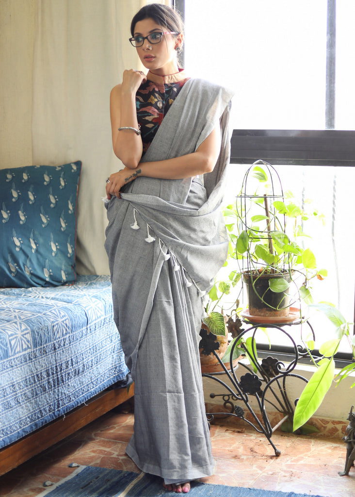 Breezy slate grey Cotton saree with white tassel and Kalamkari blouse piece