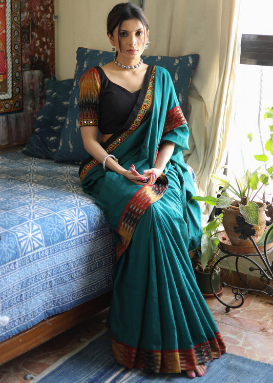 Comfortable peacock green Cotton saree with beautiful mirror work & Ikat border