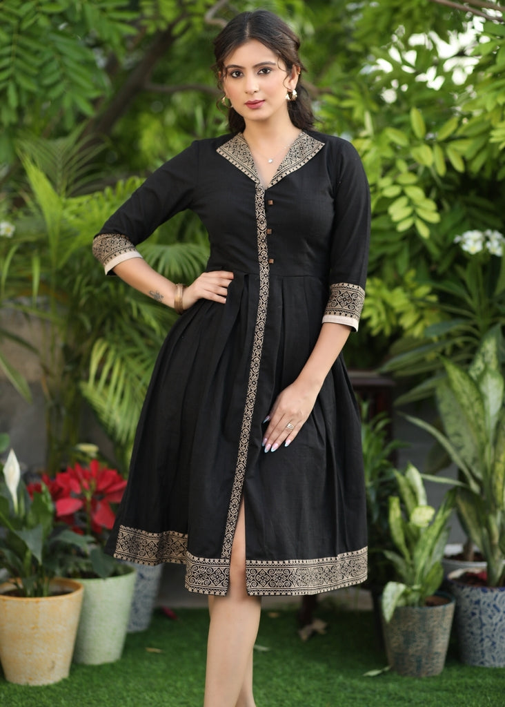 Beautiful Black Cotton Ajrakh Dress with Ajrakh Neckline and Sleeves Sujatra Beautiful Black Cotton Ajrakh Dress with Ajrakh Neckline and Sleeves Sujatra