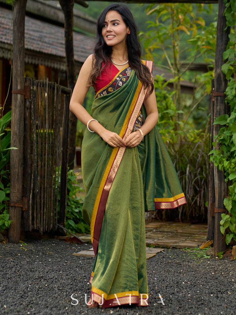 Exclusive green tissue saree with hand painted kalamkari borders & maharashtrian khun border
