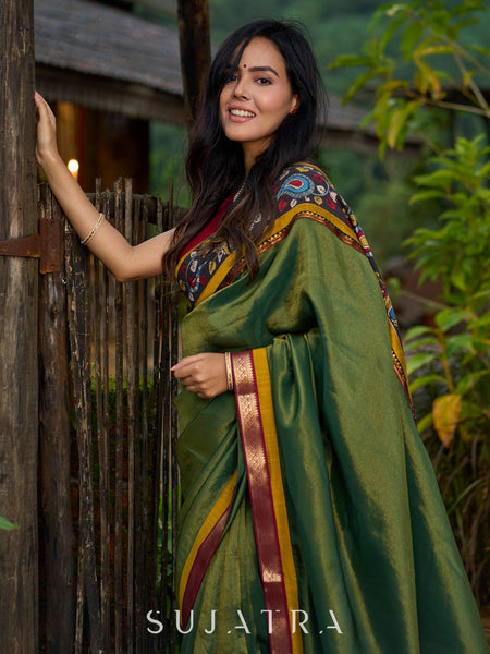Exclusive green tissue saree with hand painted kalamkari borders & maharashtrian khun border