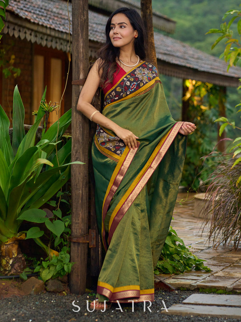 Exclusive green tissue saree with hand painted kalamkari borders & maharashtrian khun border