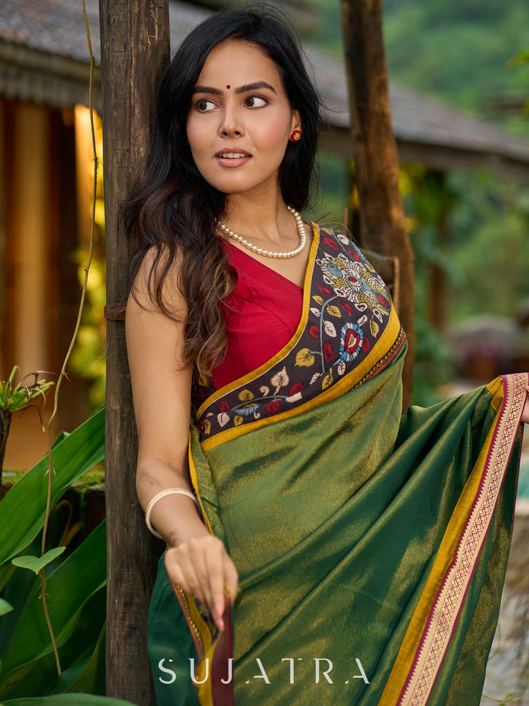Exclusive green tissue saree with hand painted kalamkari borders & maharashtrian khun border