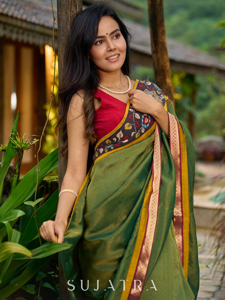 Exclusive green tissue saree with hand painted kalamkari borders & maharashtrian khun border