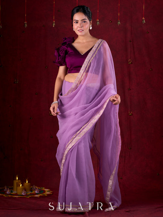 Soft Lavender Crepe Saree Adorned with Delicate Embroidered Lace Border