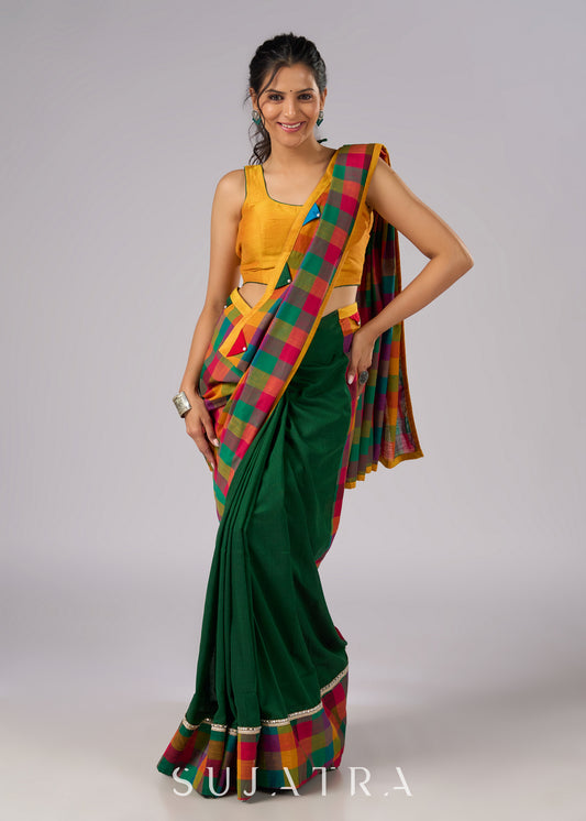 Festive plaid cotton saree in green, orange, and yellow tones