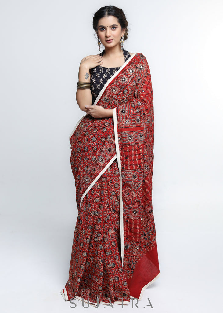 Stunning Red Ajrakh Saree with Mirrorwork detailing & White Border