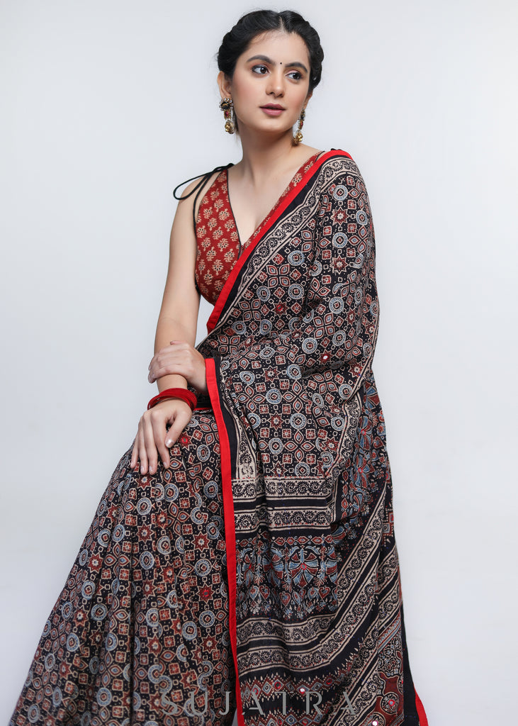 Gorgeous Black Ajrakh Cotton Saree with Red Border