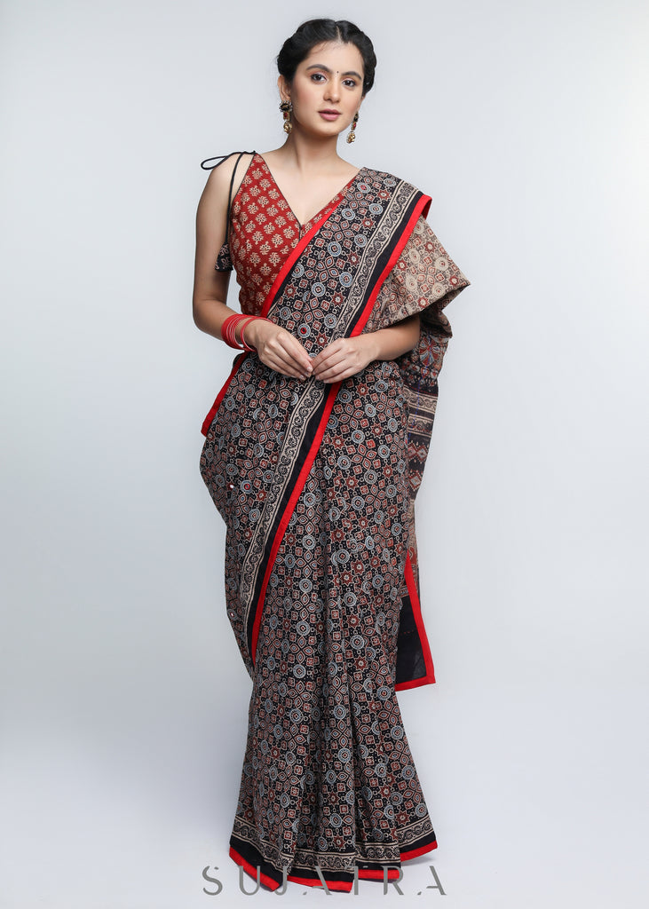 Gorgeous Black Ajrakh Cotton Saree with Red Border